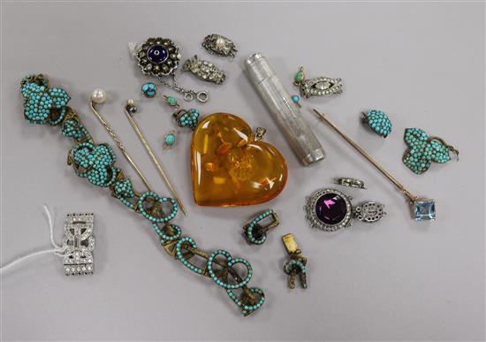 Mixed items, including a silver cased silver cigarette holder, assorted paste set clasps, three stick pins, amber pendant etc.